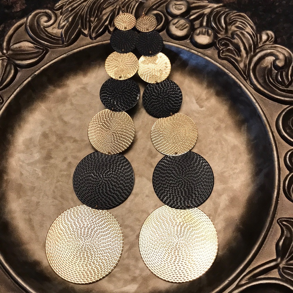 Extra long black and gold disc earrings